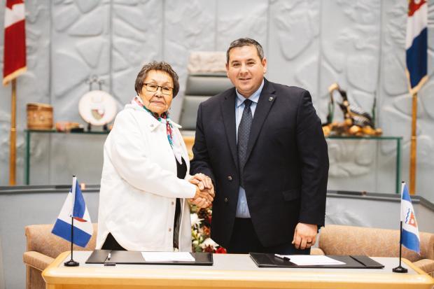 Minister Vince McKay is sworn in by Commissioner Margaret Thom in December 2023.